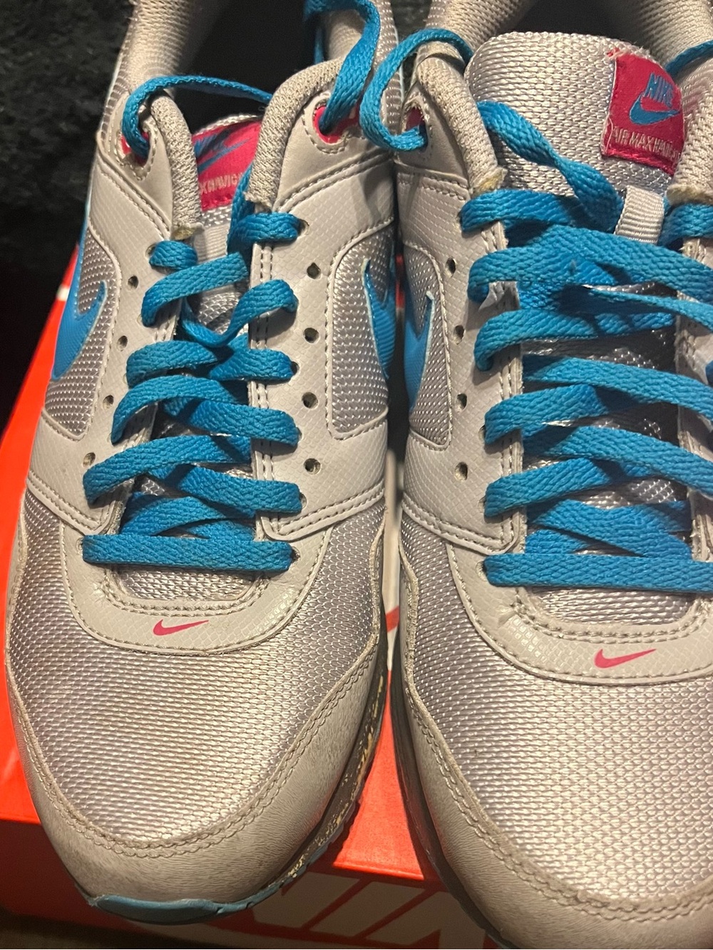 Nike White and Gray Kids Sneaker with Blue Accent